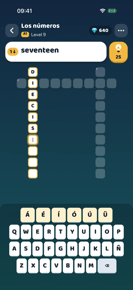 The clue “seventeen” with the Spanish answer typed on an on-screen keyboard.